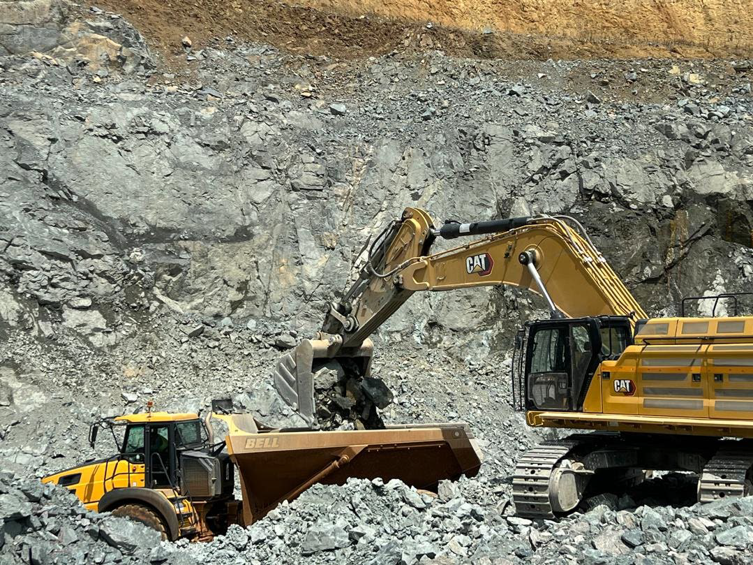 Figure 3: Load and Haul with New 374 Excavator and Haul Truck